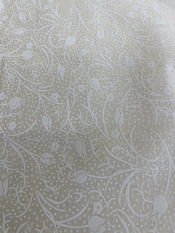 Ivory on ivory floral on vines(i) quilt back.  108” wide, 100% cotton and $9.99.