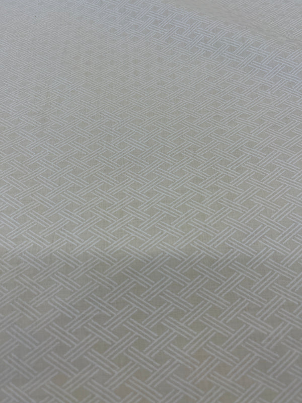 Ivory on ivory lattice(g) quilt back.  108” wide, 100% cotton and $9.99 per yd.