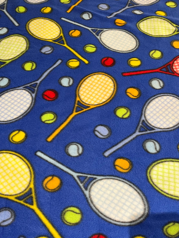 Tennis anyone?  Royal blue background with tennis racquets.  58” wide, 100% polyester and $6.99 per yd.