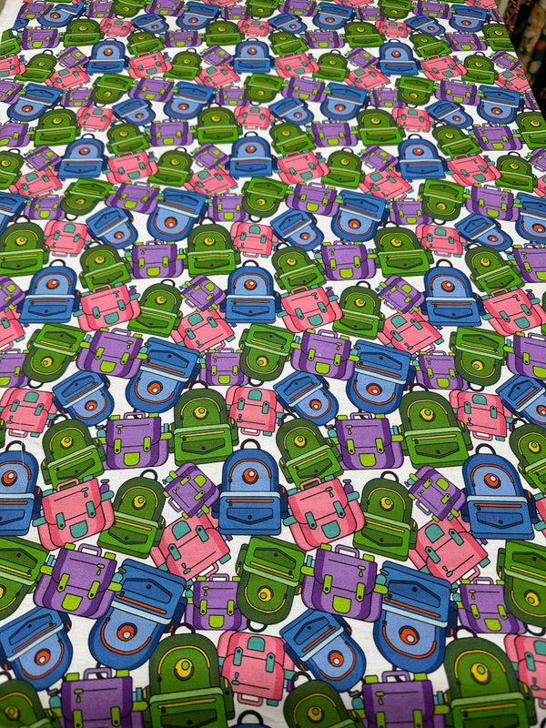 Back to School Backpack on White Cotton - Quilting Fabric - 44/45" Wide - 100% Cotton