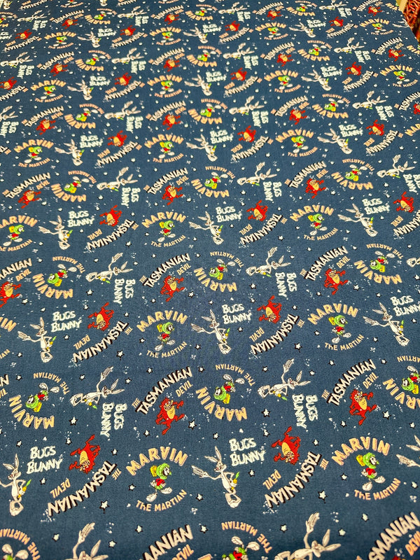 Bugs Bunny & Friends on Blue Cotton - Quilting Fabric - 44/45" Wide - 100% Cotton - Sec 2