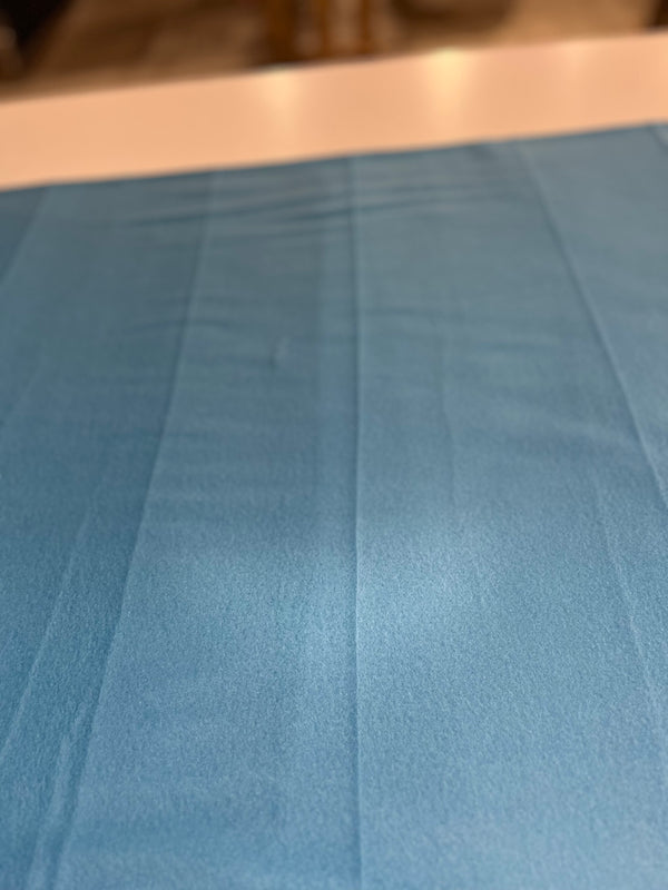 Turquoise fleece-solid color turquoise fleece.  58” wide, 100% polyester and $6.99 per yd.