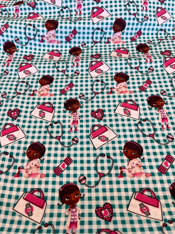 Doc in plaid-springs creative.  100%cotton, 44” wide and $4.99 per yd.
