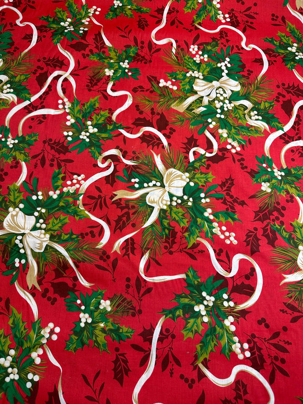 Christmas Fabric - Hollies and Ribbon on Red Poly/Cotton - 60" Wide - 65% Polyester - 35% Cotton