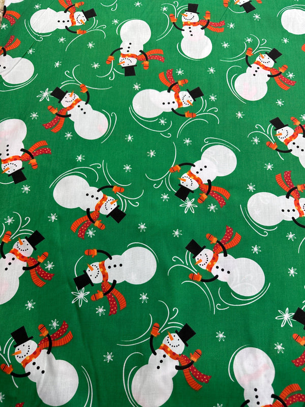 Christmas Fabric - Snowman on Green Poly/Cotton - 60" Wide - 65% Polyester - 35% Cotton