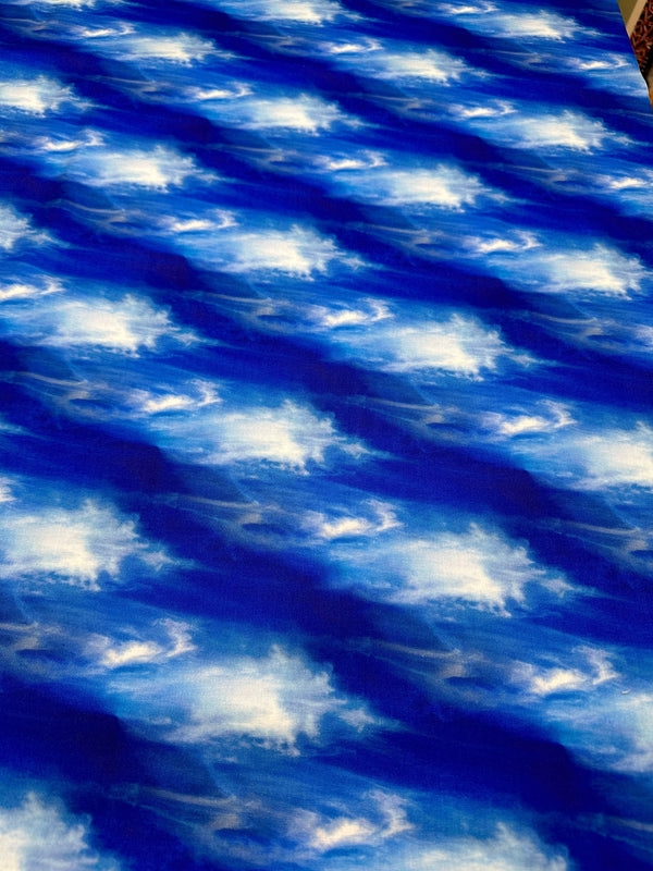 Clouds on Blue Cotton - Quilting Fabric - 44/45" Wide - 100% Cotton - Sec 1