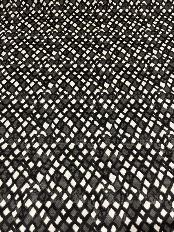 Black diamonds drapery/upholstery fabric.  100% cotton, 54” wide and $4.99 per yd.