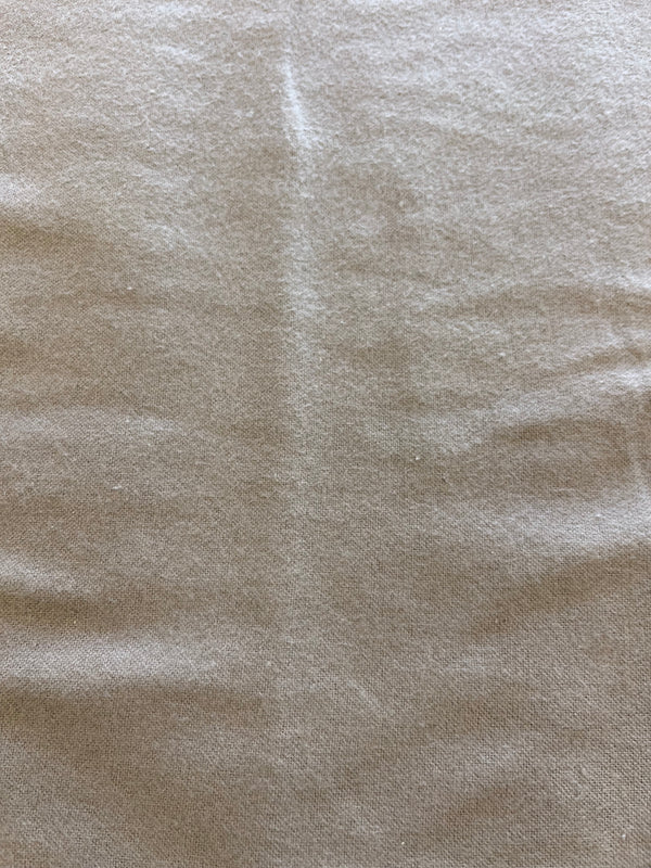 Medium grey flannel.  100% cotton, 44”wide and $4.99.