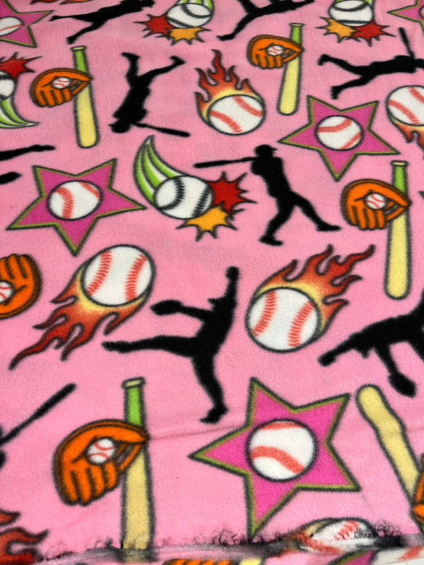Softball fleece. Softball/baseball on pink background.  58” wide,$6.99 per yard and 100% polyester