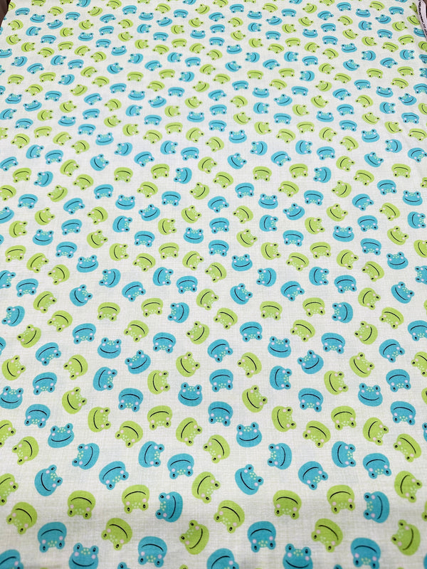 Frog Faces on White Cotton - Quilting Fabric - 44/45" Wide - 100% Cotton - Sec 2