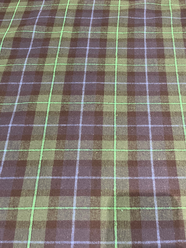 Green, navy and black plaid flannel.  Yard dyed,60” wide, 100% cotton and $6.99 per yd.