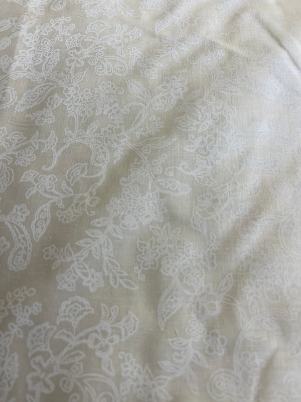 Ivory on ivory floral(h) quilt back.   108” wide, 100% cotton and $9.99 per yd