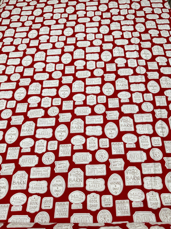 Lables on Red Cotton - 44/45" Wide - 100% Cotton sec ST